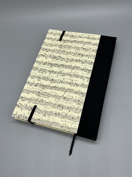 Buch Leinenrücken  Rückseite handgebunden schwarz creme Noten Musik
